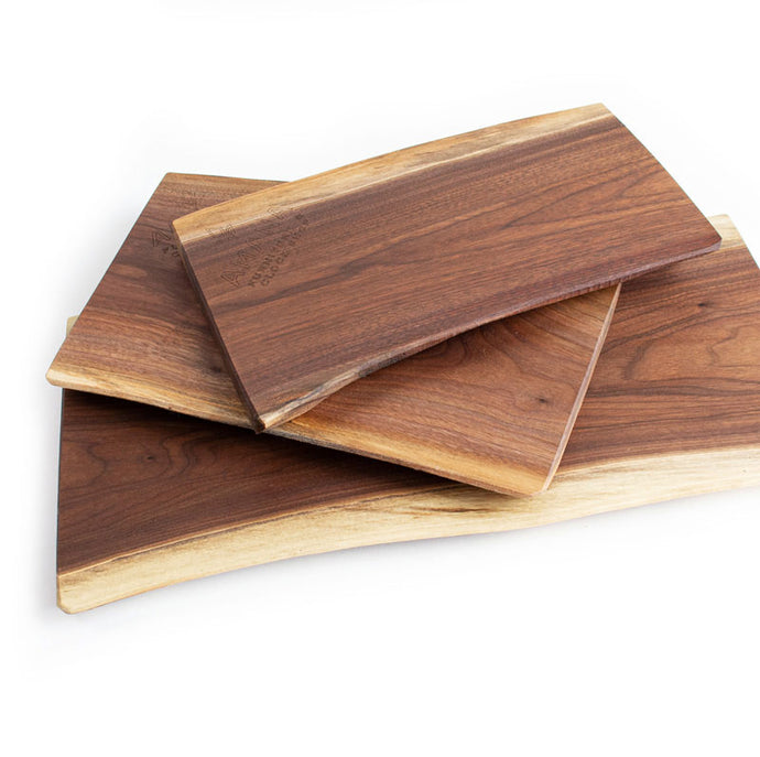 a stack of three charcuterie boards