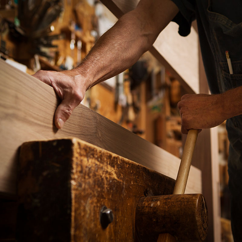 Amana furniture shop craftsman at work